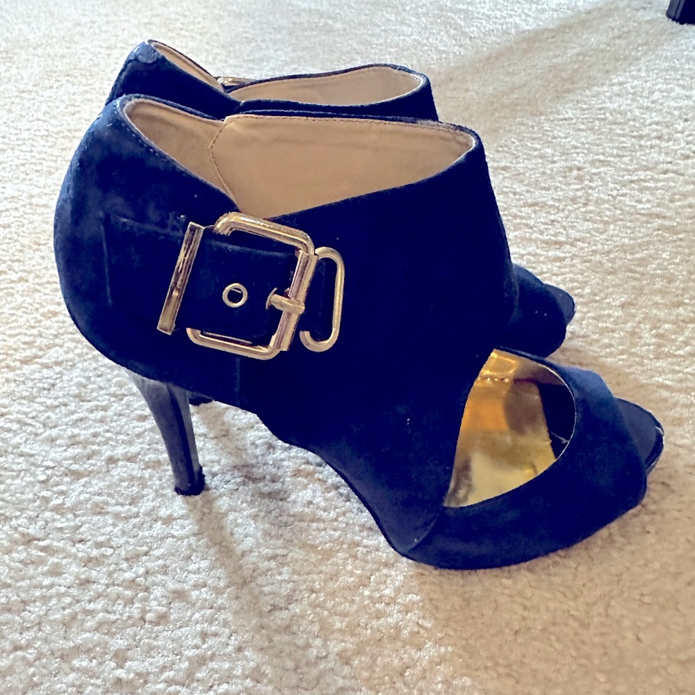 Navy blue suede Bootie with peep toe and side cutouts w/ gold buckle details